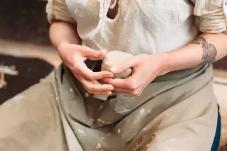 Stages of Clay 101 4 lump of clay in hands