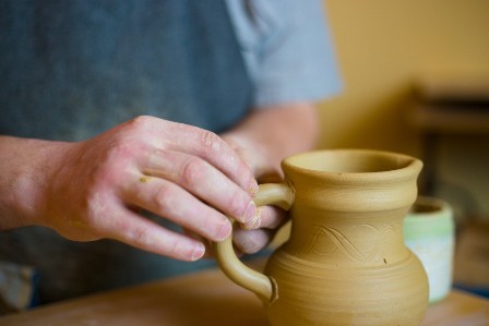 putting handle on pottery