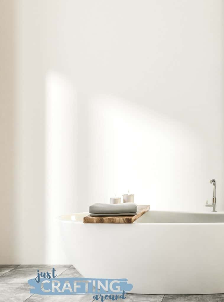 38 Towel Storage Ideas: How to Organize Your Towels 8 tub with over the tub towel rack