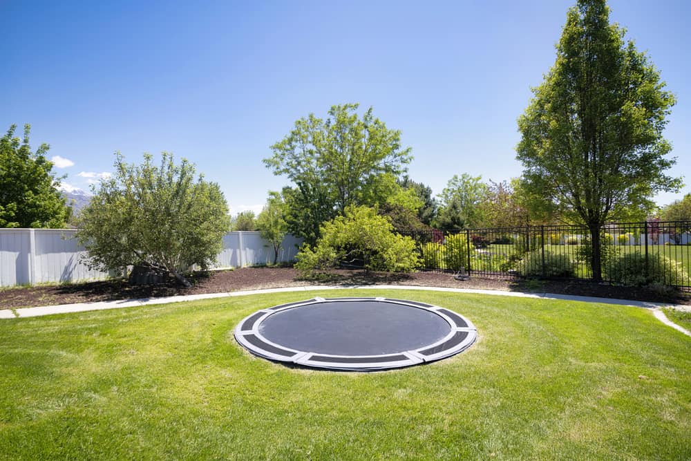In-ground trampoline on a lawn