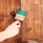 Painting wooden fence